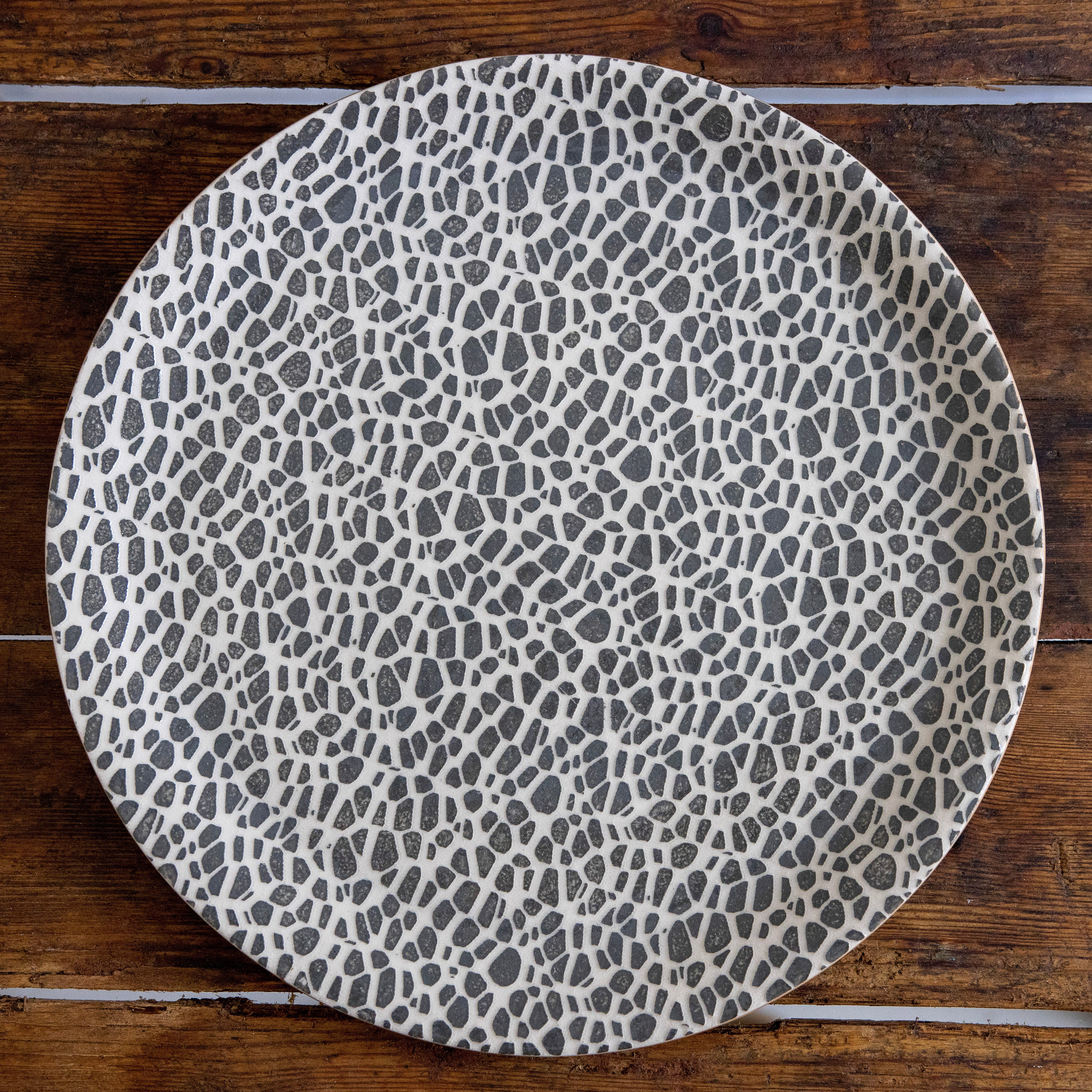 Terrafirma <br> Charcoal Pebble Charger Plate