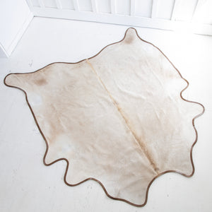 Champagne Cowhide with Leather Trim