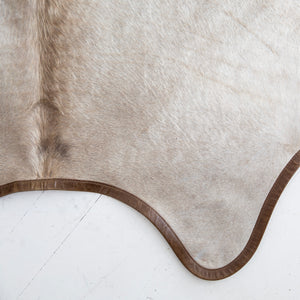 Champagne Cowhide with Leather Trim